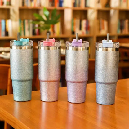 Four glittery teal and silver decorbites coffee cup thermos insulated mugs with metallic lids and colorful straw holders
