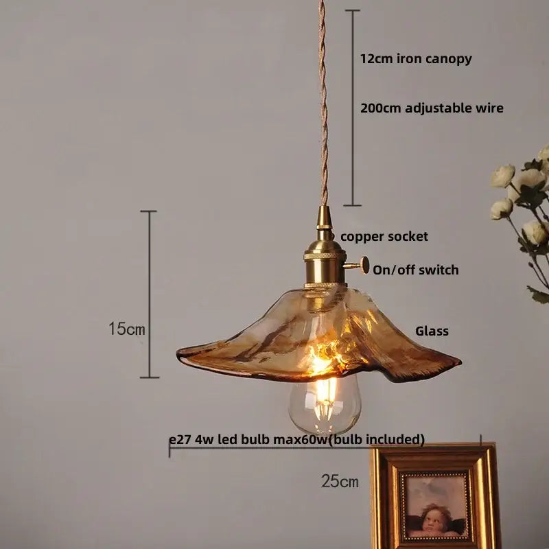 Textured amber glass pendant light with brass copper socket and twisted iron canopy for dining room decorbites amber glass