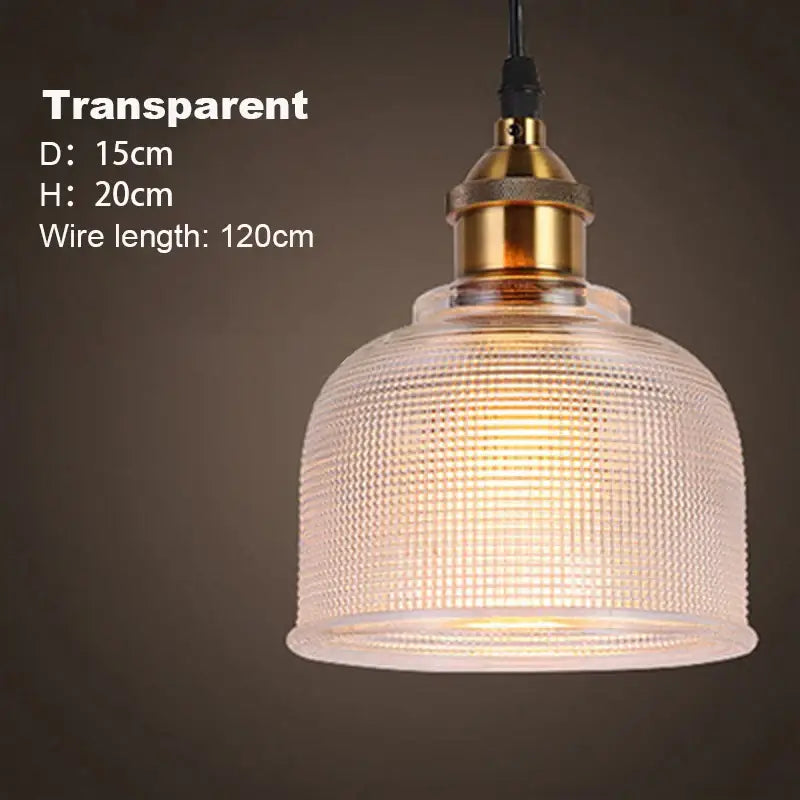 Transparent glass pendant lights with gold metal base and textured grid design for dining room lighting