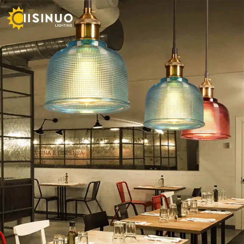 Blue textured glass pendant lights with brass fixtures for dining room set featuring glass pendant lights