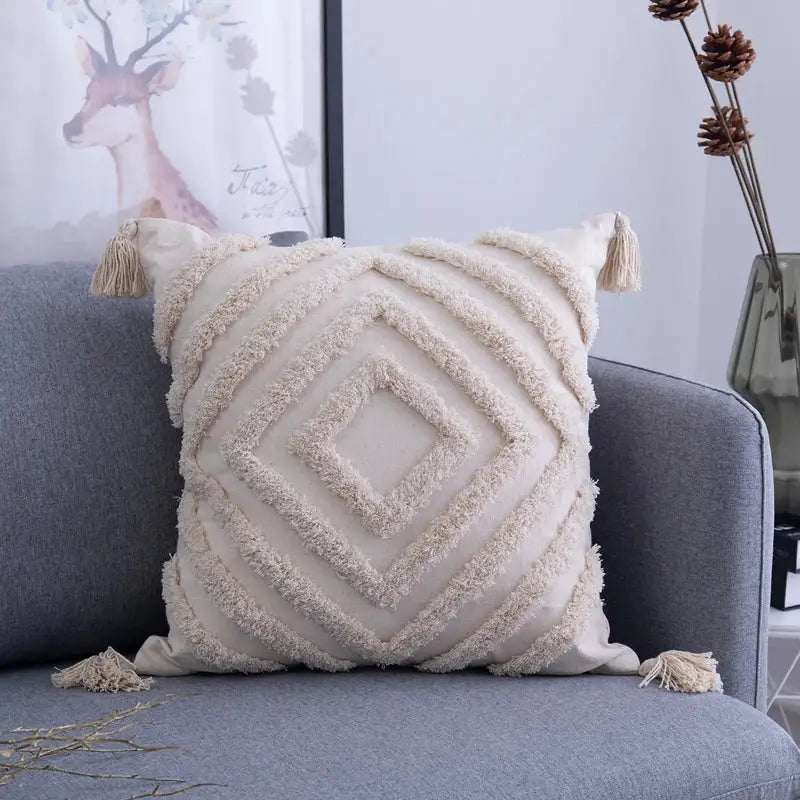 Cream-colored cushion cover with textured diamond pattern and decorbites beige tassels cushion for living room decor