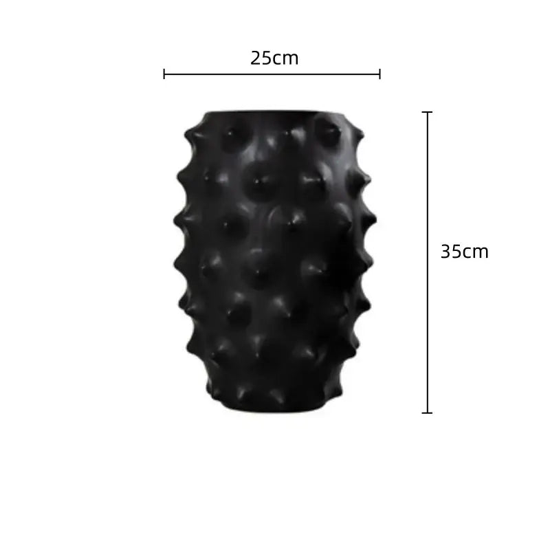 Black ceramic flower vase with textured spiky surface for living room decor by decorbites black ceramic collection