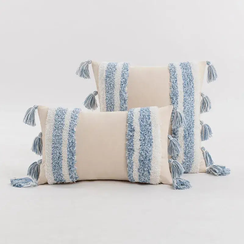 Beige cushion cover with textured blue and white vertical stripes and tassels for home decor by decorbites blue grey