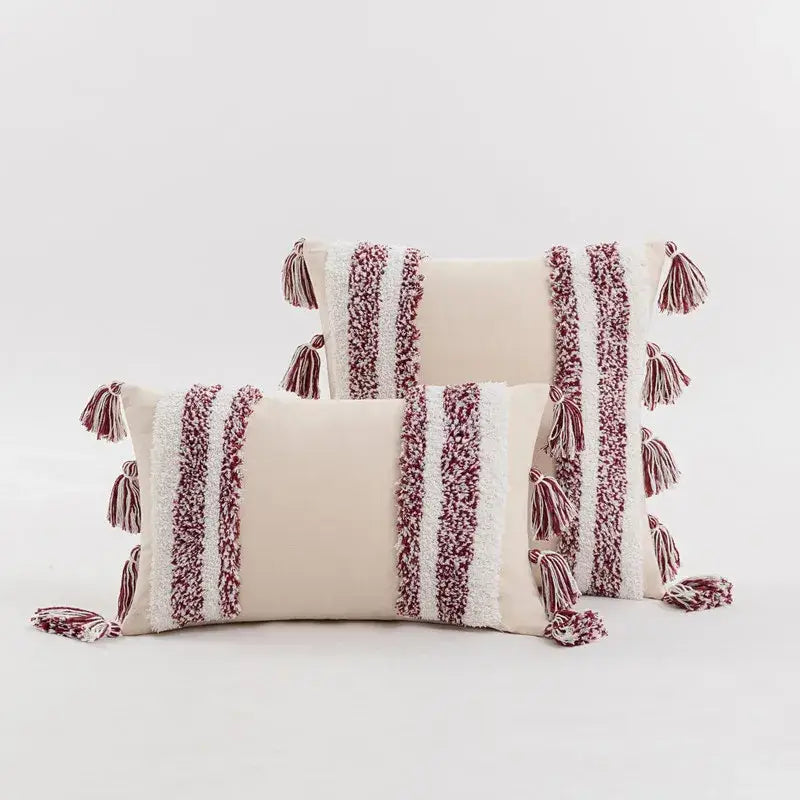 Cream-colored cushion cover with textured maroon and white stripes and tassels for home decor by decorbites blue grey