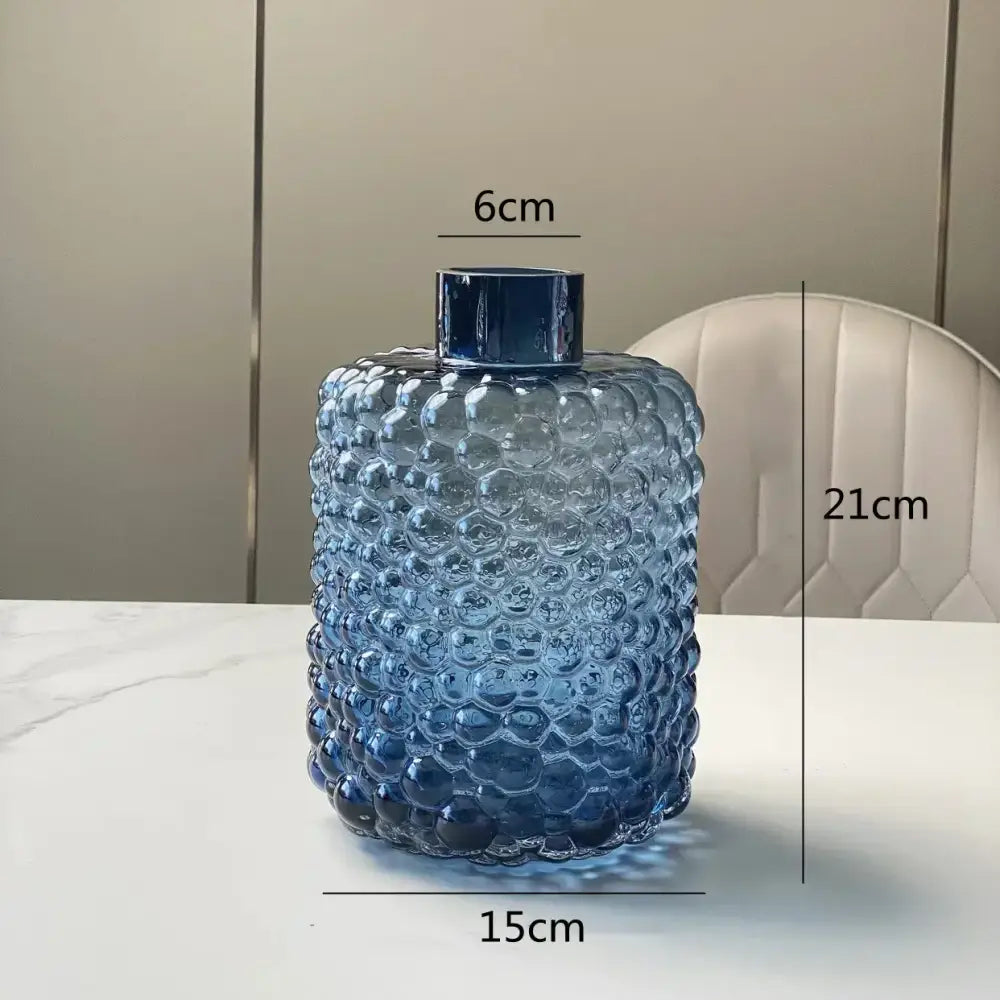 Textured blue glass flower vase with bubble surface and sleek metallic lid for living room decorbites clear glass decor