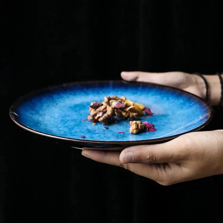 Vibrant blue decorbites ceramic dinner plate with textured glazed surface and dark rim in dinner plate set for kitchen use