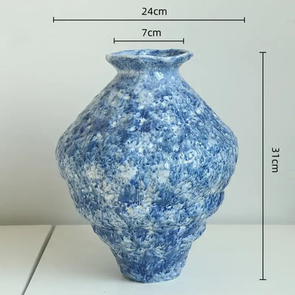 Textured blue ceramic vase with flared rim rounded body and tapered base for ceramic vase hydroponic decorbites blue ceramic set