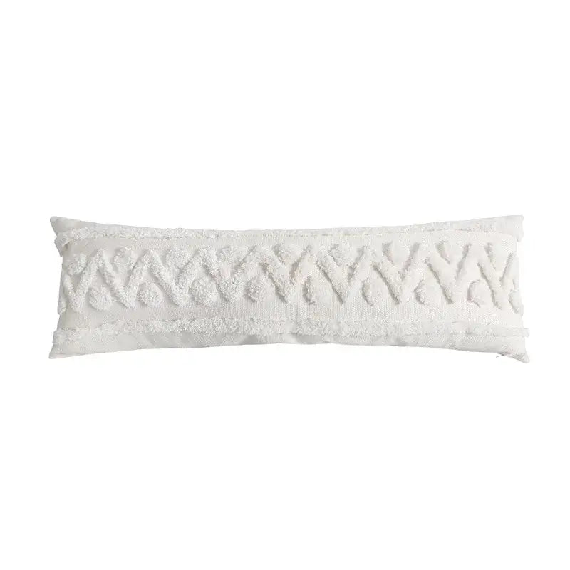 White textured throw pillow with woven geometric pattern and frayed edges complementing decorbites blue geometric cushion cover