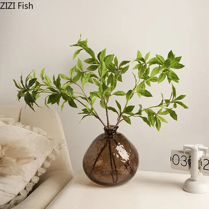 A brown glass vase hydroponics plant pot with textured design holding artificial green foliage for living room decorbites brown glass
