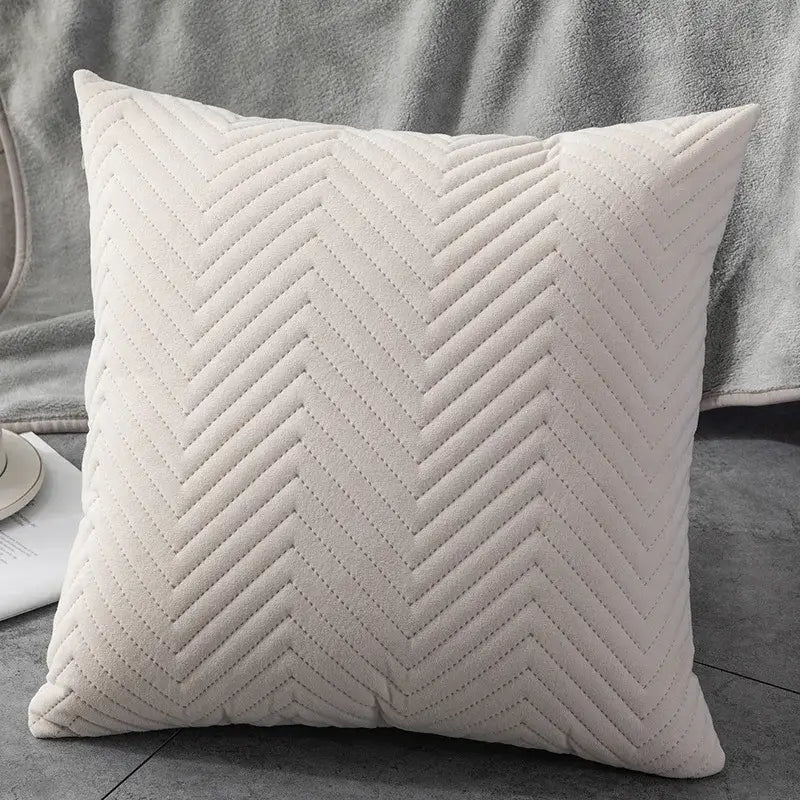 Cream-colored cushion cover with plush texture and prominent zigzag quilting for decorbites blue wave decor