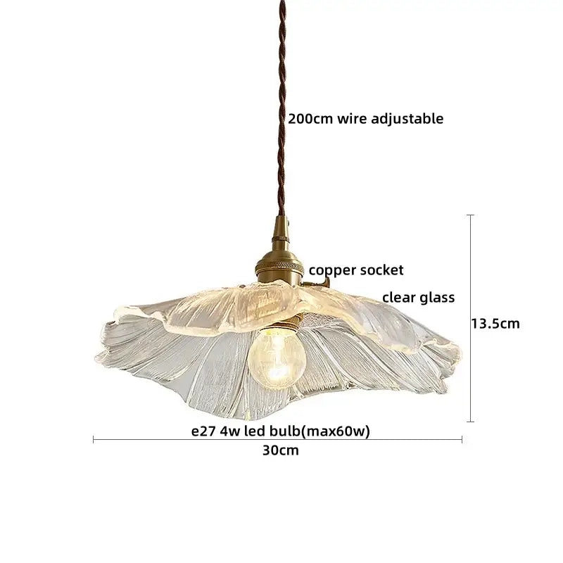 Textured clear glass led pendant light with a translucent clear glass shade copper socket and braided wire suspension