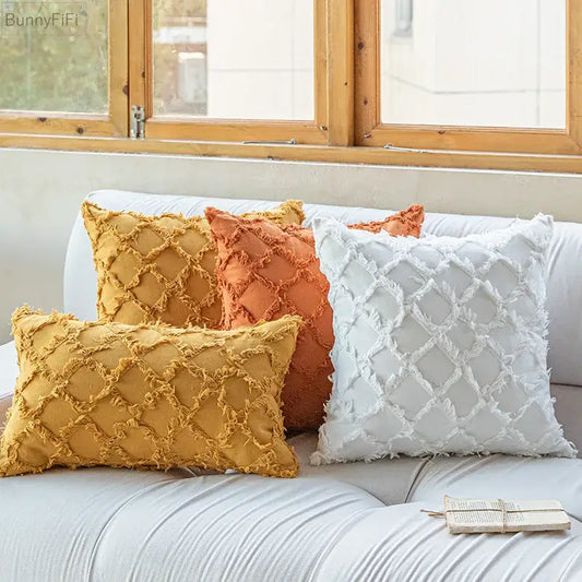 Set of three decorbites cotton diamond cushion covers in mustard yellow, terracotta orange, and white with textured diamond pattern