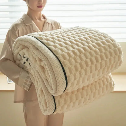 Cream coral fleece warm blanket with textured diamond pattern and black trim ideal for cozy bedroom decorbites use