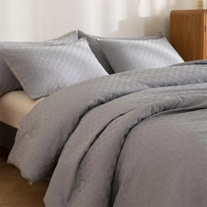 Gray textured duvet cover quilt set with subtle woven pattern and soft fabric finish for decorbites comforter bedroom use