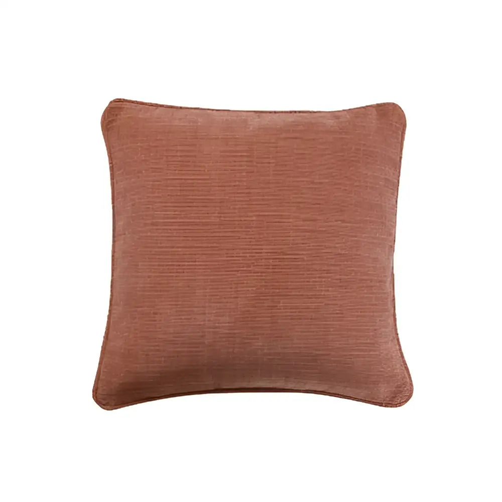 A rust-colored textured cotton linen pillow cover from decorbites ideal as a cushion cover for living room decor