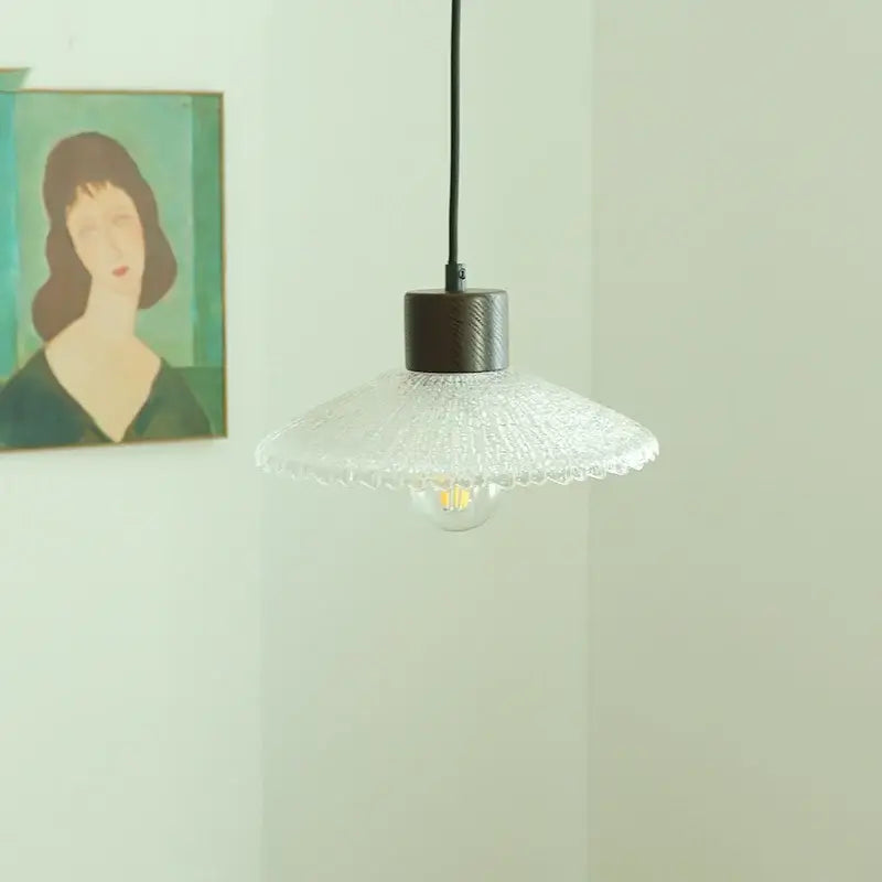 Clear glass led textured pendant light with dark metal fixture and black cord for kitchen decorbites clear glass lighting