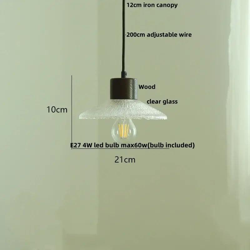 A rustic pendant light with dark wood canopy and clear glass led bulb ideal for kitchen decorbites clear glass design
