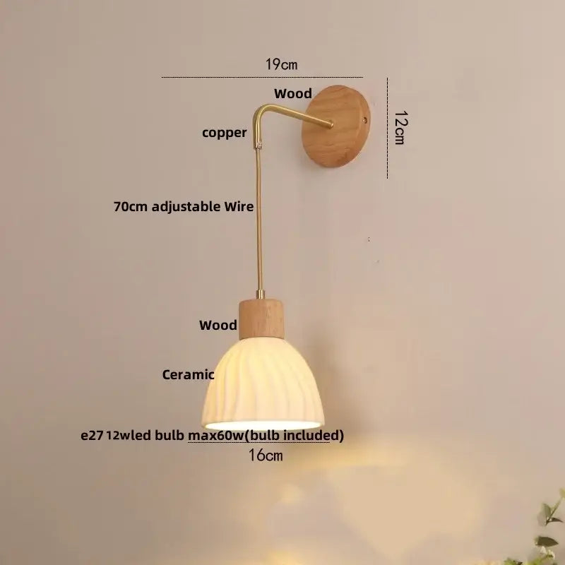 A warm-toned ribbed ceramic lampshade on an adjustable copper arm with wooden wall plate led wall light decorbites adjustable led