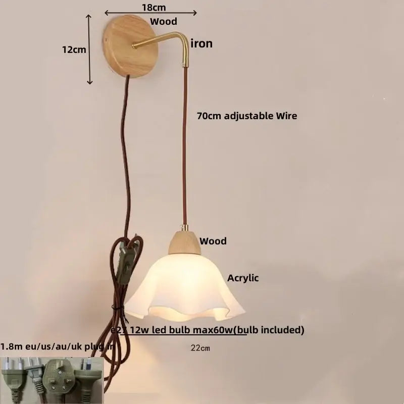 A warm-toned decorbites adjustable led wall light with wooden base, brass iron arm, and acrylic bell shade for bedroom