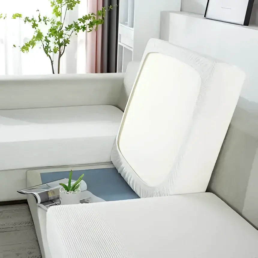 White textured fabric sofa cover with fringed edges for living room furniture protector in green and beige elastic design