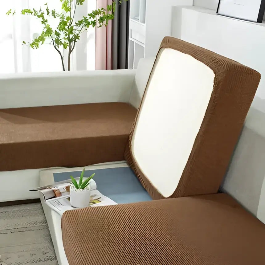 Brown textured fabric sofa cover with white inner lining for living room furniture protection and elasticity