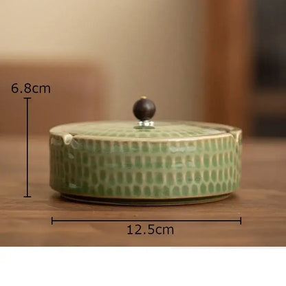 Textured green ceramic ashtray with dotted pattern and dark wooden knob lid by decorbites ceramic for office or living room decor