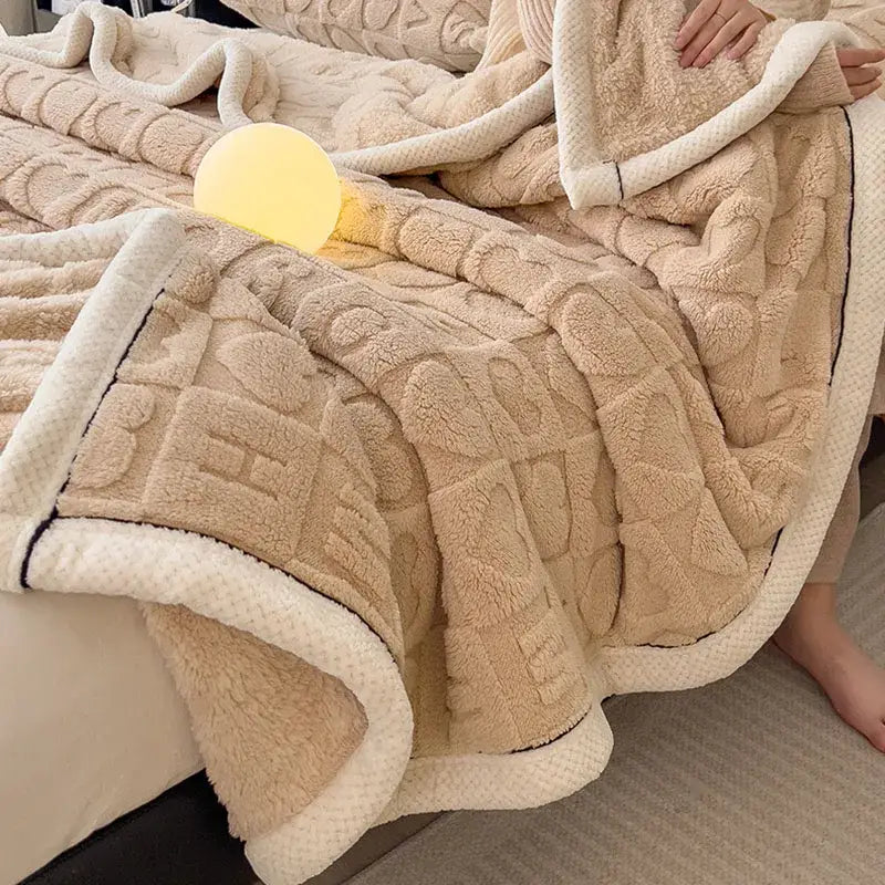 Beige plush lamb wool blanket with textured quilted pattern and cream fleece lining for cozy lamb decorbites use