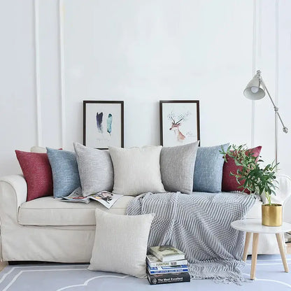 Beige linen sofa with decorbites linen cotton textured throw pillowcase in red blue and gray for living room decor