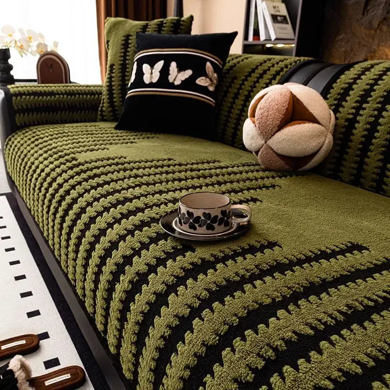 Textured olive and black striped knitted sofa cover with chunky knit pattern for living room slipcover use