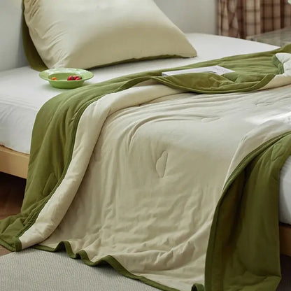 A cozy olive green and cream decorbites cotton summer comforter with quilted texture for bedroom cooling