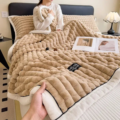 Beige plush quilted blanket with soft textured surface and white fleece lining from decorbites cozy flannel velvet collection