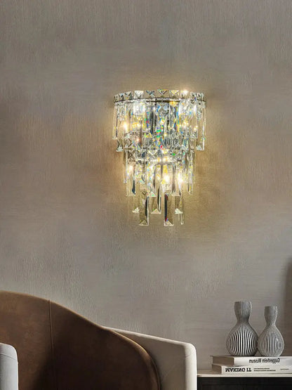 A tiered cascading crystal wall light with a sleek metallic frame for luxury living room decorbites crystal wall use