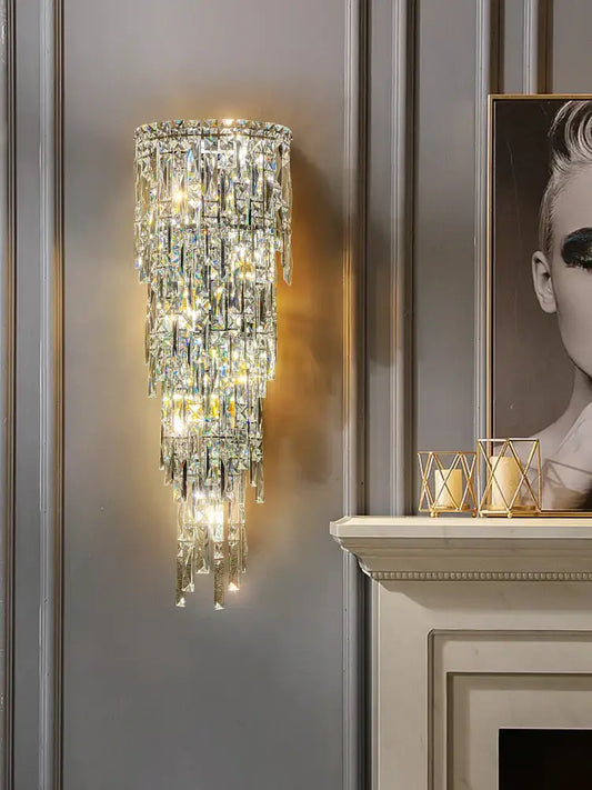 Tiered cascading crystal wall light with clear faceted glass elements for luxury living room decorbites crystal wall sconce