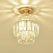 A tiered decorbites black gold minimalist led chandelier with gold-toned metal and clear glass prisms in concentric rings