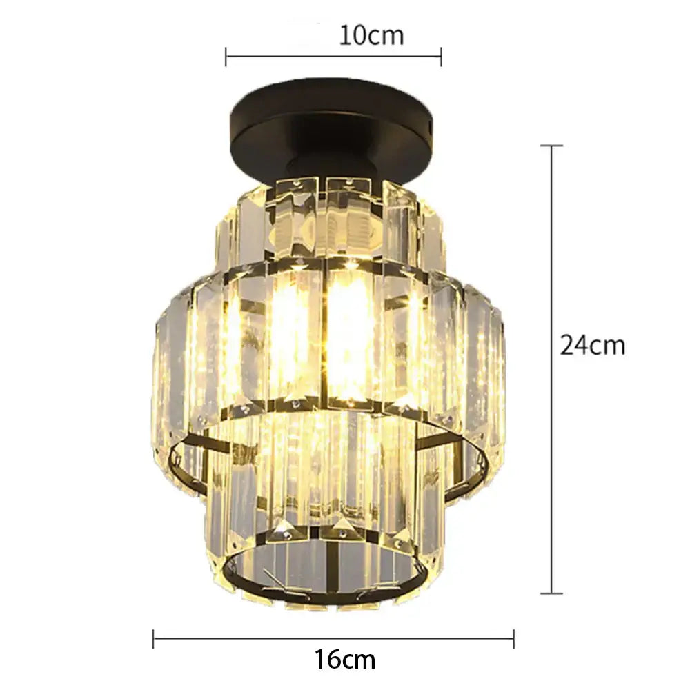 A tiered decorbites black gold minimalist led chandelier with black metal frame and cascading clear glass prisms
