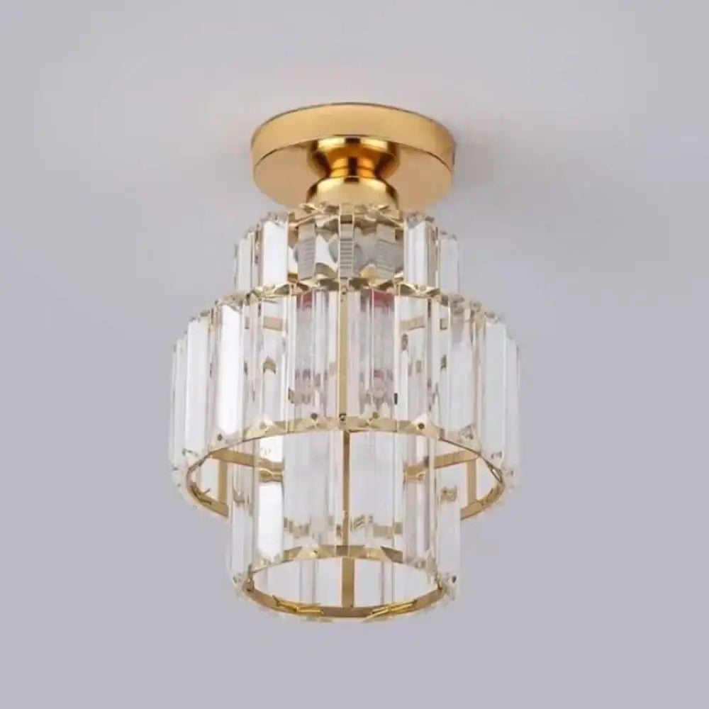 A tiered decorbites black gold minimalist led chandelier with gold-toned metal and clear glass rods in concentric circles