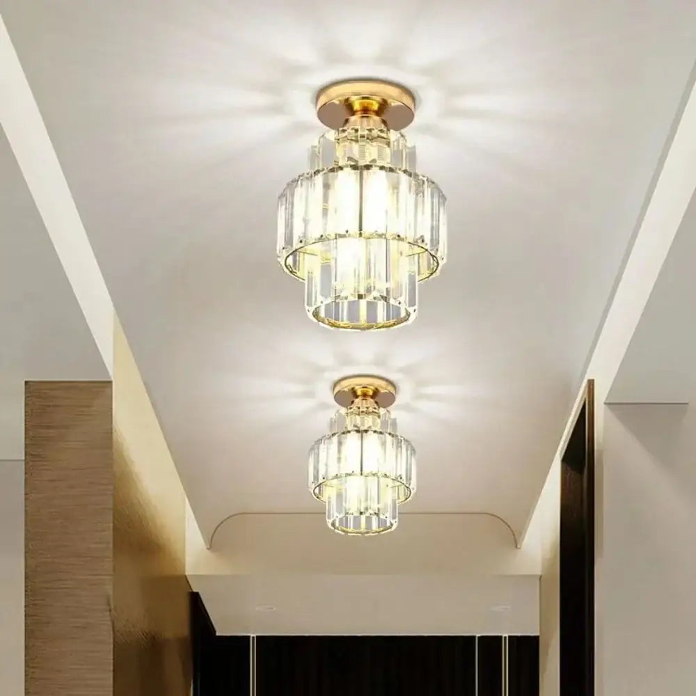 Gold-finished decorbites black gold ceiling-mounted chandelier with cascading crystal tiers and gold minimalist led lighting