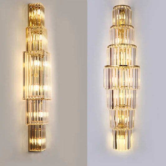 Tiered gold crystal wall lamp with clear crystal rods and metallic frames for elegant living room decorbites crystal wall lighting