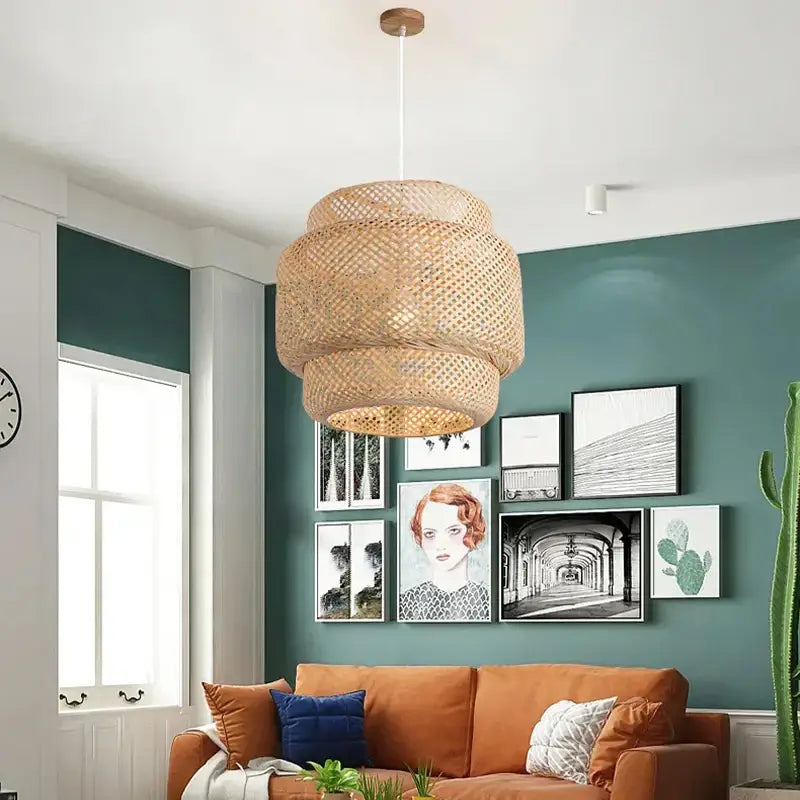 Tiered golden bamboo pendant light with natural-toned woven rattan and intricate lattice for dining room use