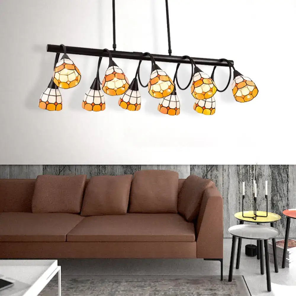 Stylish black metal bar pendant light with six amber and white stained glass shades for kitchen island lighting