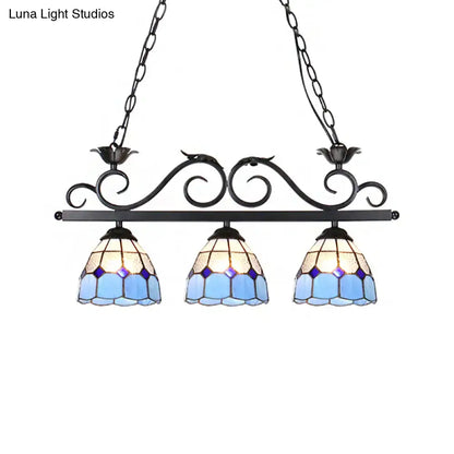 DecorBites™ curved bird pendant light fixture with blue stained glass and ornate black metal frame for island lighting