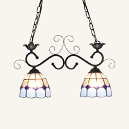 Vintage-style tiffany style double pendant light with black wrought iron arms and blue white stained glass shades ideal for balcony