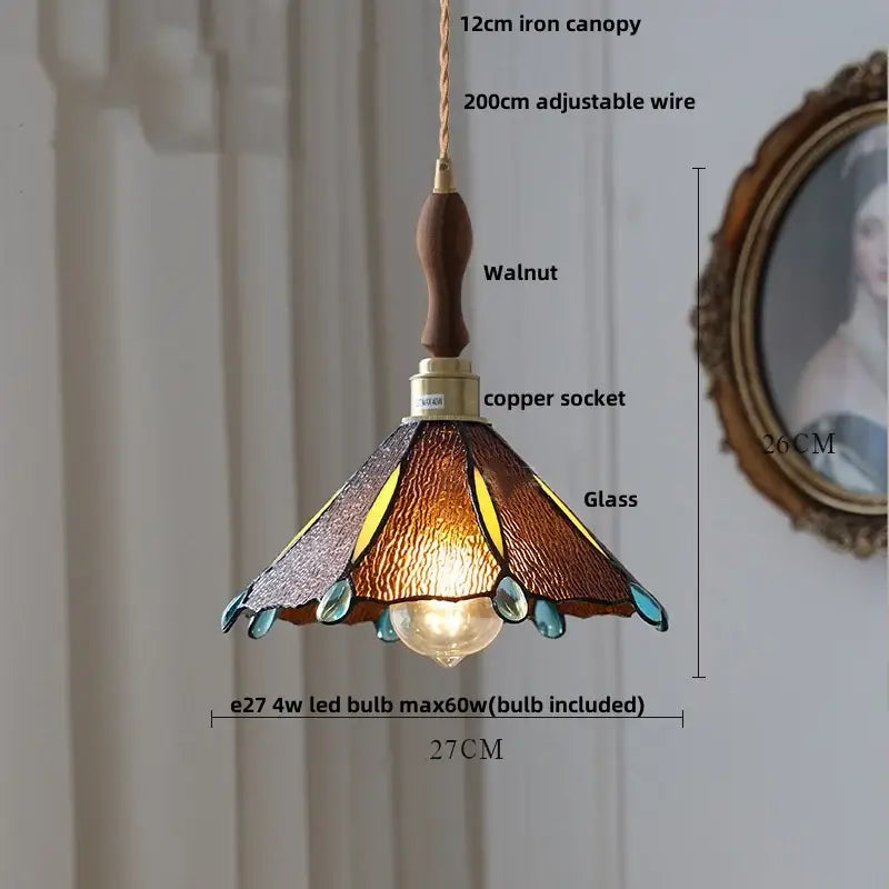 A warm-toned butterfly glass flower led pendant lamp with stained glass panels and walnut wooden handle for bedroom decorbites butterfly glass