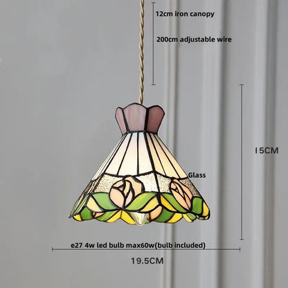 A tiffany style pink and peach butterfly glass flower led pendant lamp with floral design in leaded glass panels
