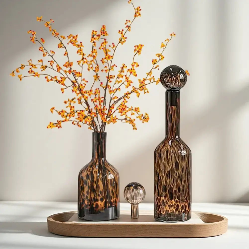 Tortoiseshell leopard print glass vase with sleek rounded neck and darkened base for decorbites leopard print decor