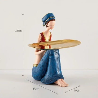 Blue resin ornament of a seated woman holding a gold tray from decorbites cute girls storage collection