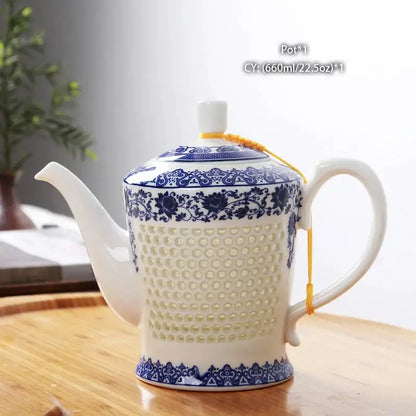 White porcelain tea with intricate blue floral patterns and perforated body from decorbites blue white collection