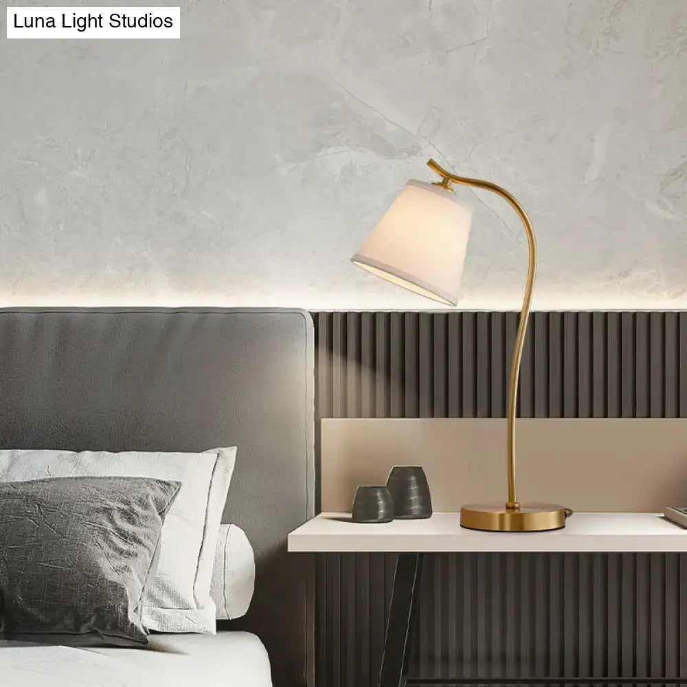 Gold-toned brass decorbites™ traditional bucket table lamp with curved stem and white fabric shade for led incandescent fluorescent 220v-240v 110v-120v use
