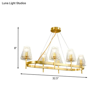 Traditional gold crystal island pendant light with five crystal-encrusted glass shades on a circular frame
