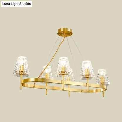 Traditional gold crystal island pendant light with five crystal-encrusted lampshades and modern gold-toned design